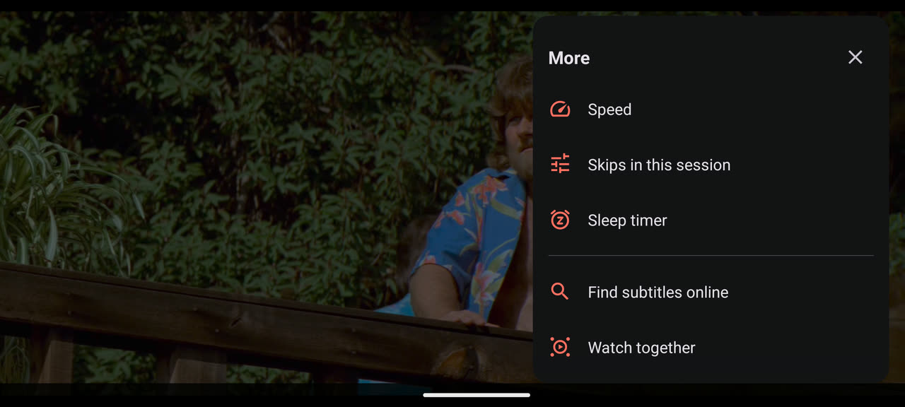 The More panel beside the picture, listing Speed, Skips in this session, Sleep timer, Find subtitles online and Watch together, each with a coral icon.