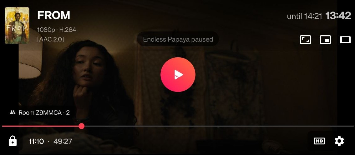 The player paused, with a Room Z9MMCA · 2 badge above the time bar and a line reading Endless Papaya paused across the middle of the frame.